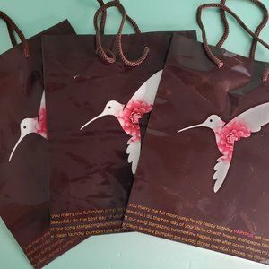 3 Papyrus paper shopping bags with handles